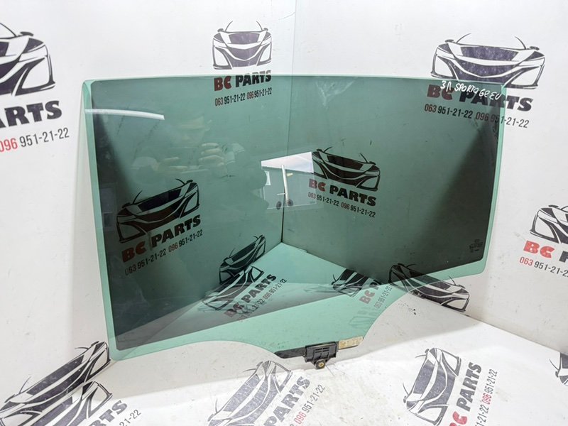 Стекло двери заднее левое Kia Sportage