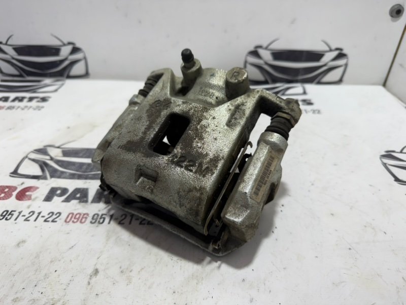 Суппорт тормозной передний правый Nissan Kicks 1.6