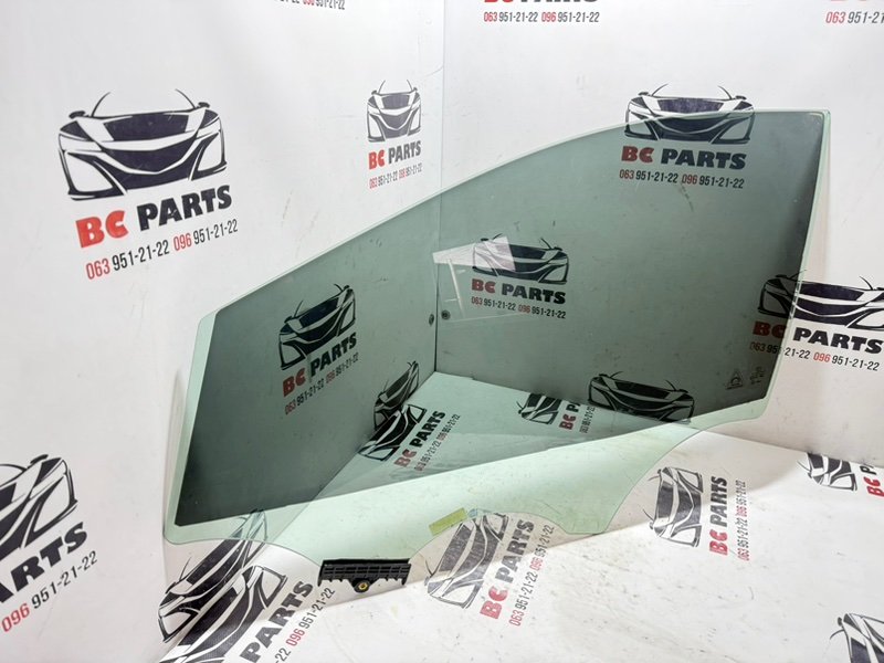 Стекло двери переднее левое Kia Sportage