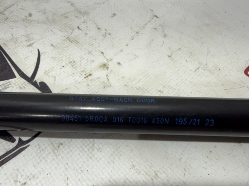 Амортизатор крышки багажника левый Kicks 2021 1.6