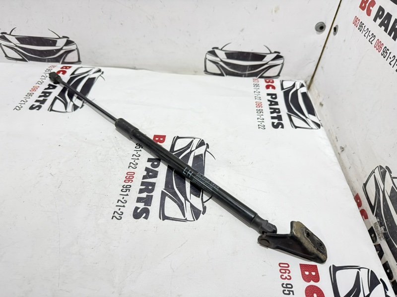 Амортизатор крышки багажника левый Kia Sportage