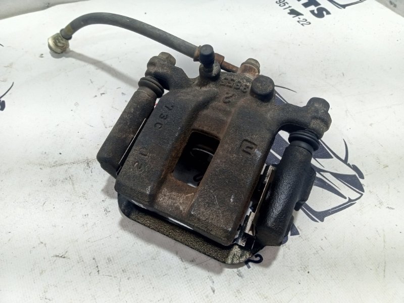 Суппорт тормозной задний левый Nissan Rogue T32 QR25 2.5