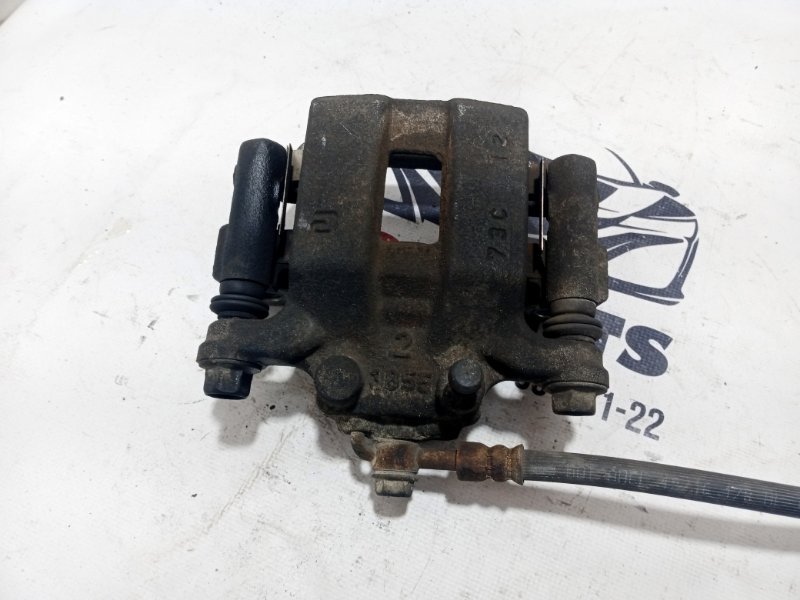 Суппорт тормозной задний левый Rogue 2017 T32 QR25 2.5