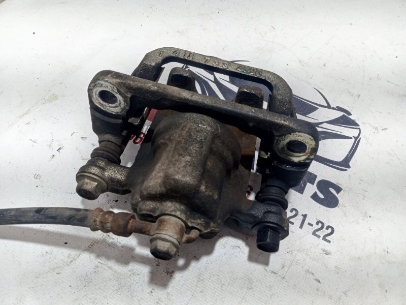 Суппорт тормозной задний левый Rogue 2017 T32 QR25 2.5