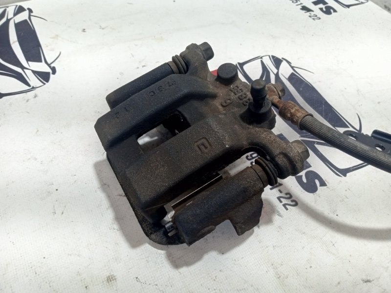 Суппорт тормозной задний правый Nissan Rogue 2017 T32 QR25 2.5 440013NK0A Б/У