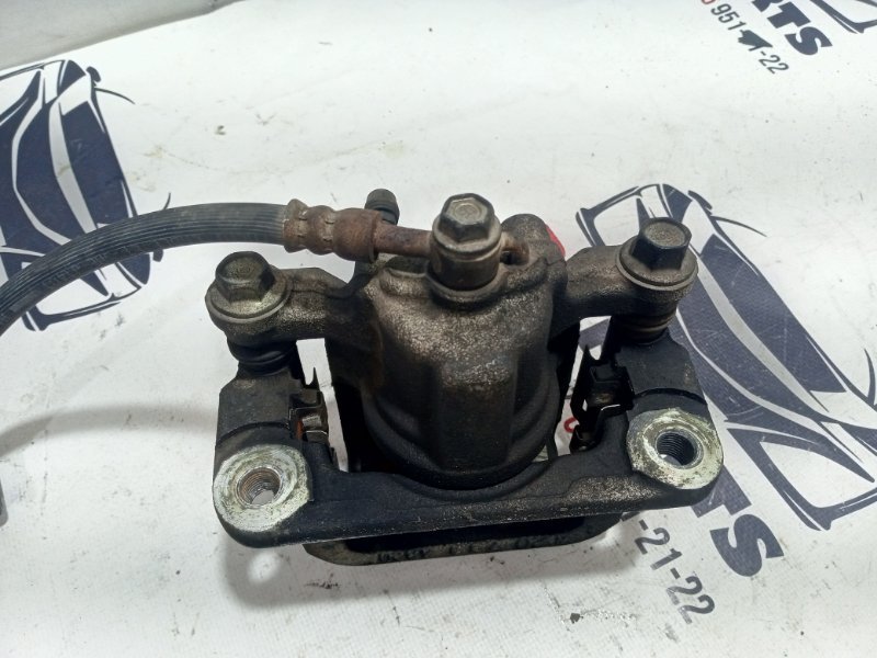 Суппорт тормозной задний правый Nissan Rogue T32 QR25 2.5