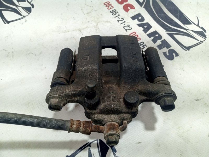 Суппорт тормозной задний правый Rogue 2017 T32 QR25 2.5