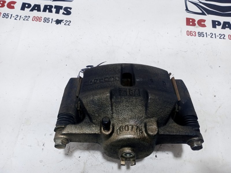 Суппорт тормозной передний левый Rogue 2017 T32 QR25 2.5