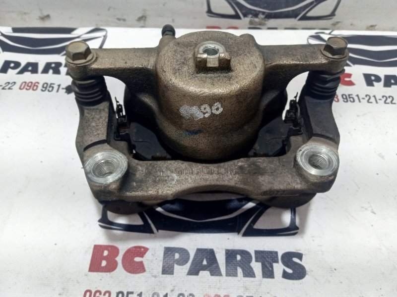 Суппорт тормозной передний левый Nissan Rogue T32 QR25 2.5