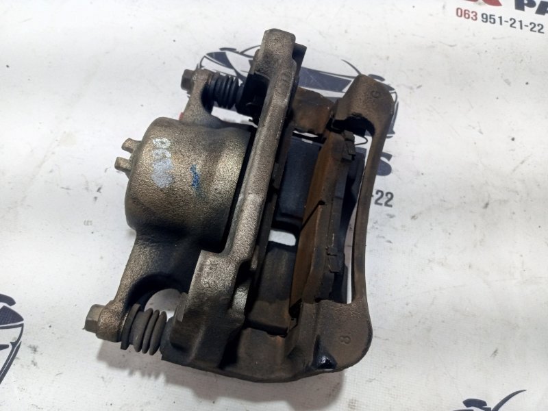 Суппорт тормозной передний левый Rogue 2017 T32 QR25 2.5