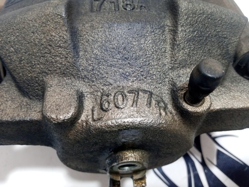 Суппорт тормозной передний правый Rogue 2017 T32 QR25 2.5