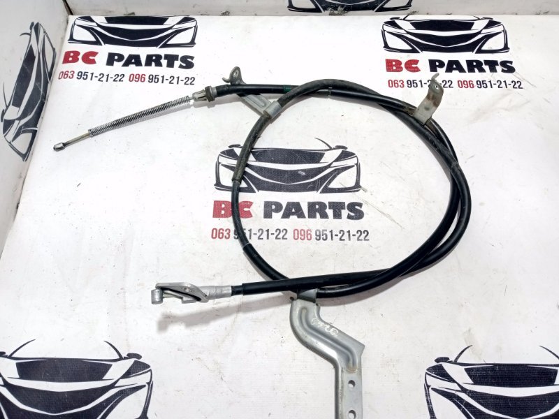 Трос стояночного тормоза левый Kicks 2021 1.6