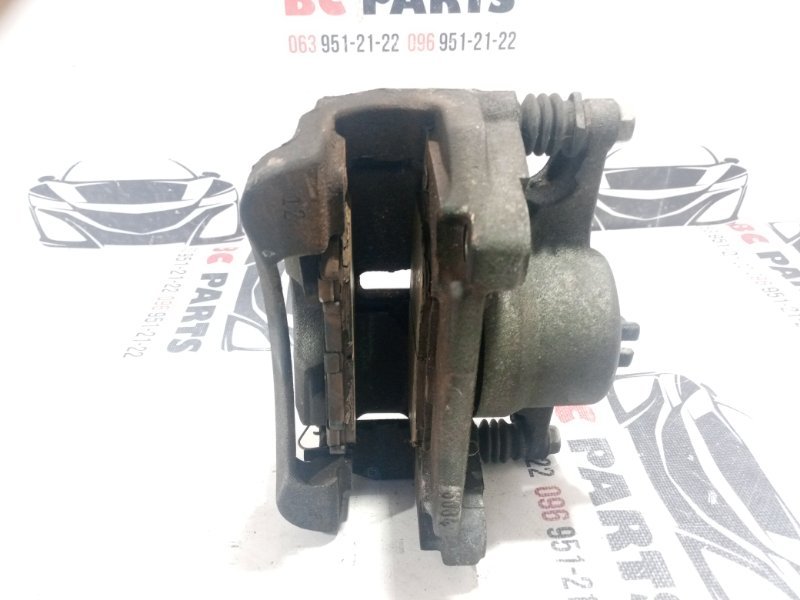 Суппорт тормозной передний правый Rogue 2019 T32 QR25 2.5