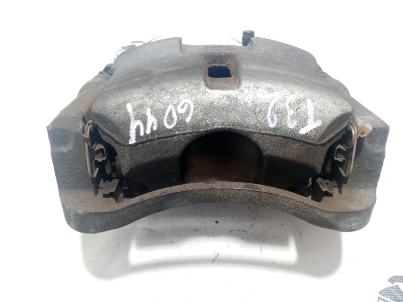 Суппорт тормозной передний левый Rogue 2019 T32 QR25 2.5