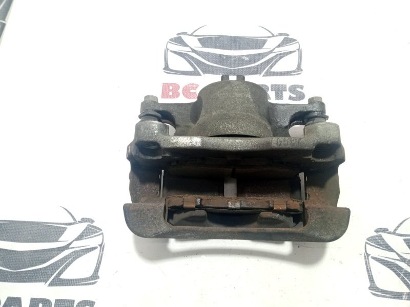 Суппорт тормозной передний левый Nissan Rogue T32 QR25 2.5