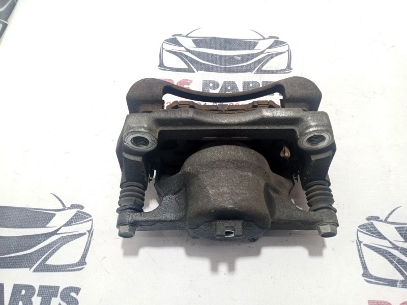 Суппорт тормозной передний левый Rogue 2019 T32 QR25 2.5