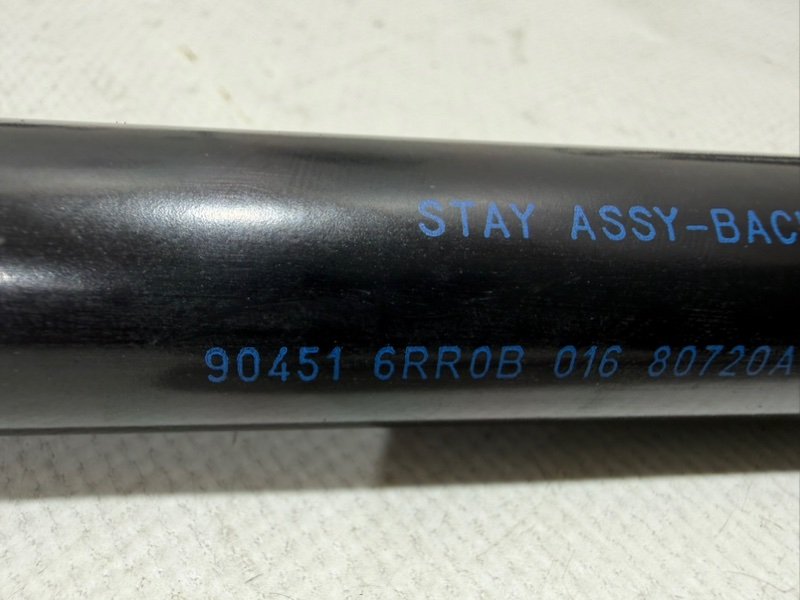 Амортизатор крышки багажника левый Rogue 2021 T33 2.5