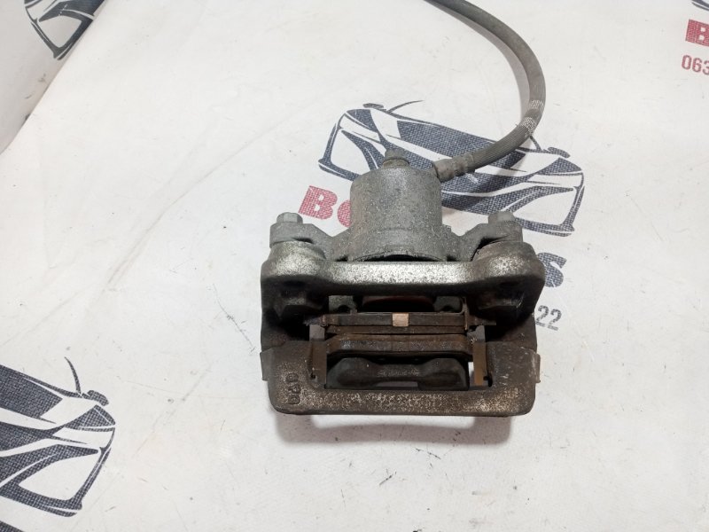 Суппорт тормозной задний правый Kia Sportage