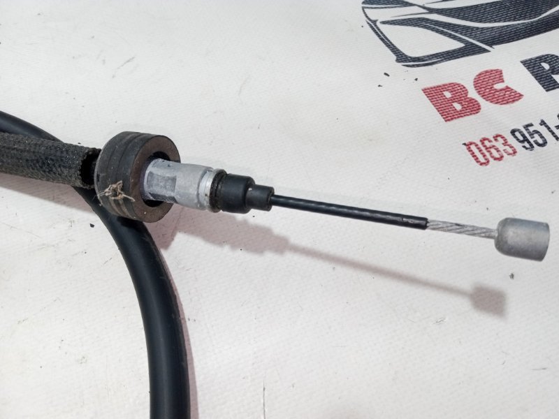 Трос стояночного тормоза левый Kia Sportage