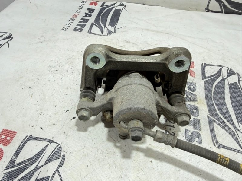 Суппорт тормозной задний левый Sportage 2017