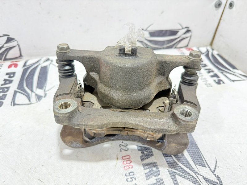 Суппорт тормозной передний правый Rogue 2019 T32 QR25 2.5