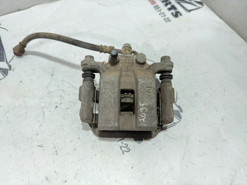 Суппорт тормозной задний левый Rogue 2019 T32 QR25 2.5