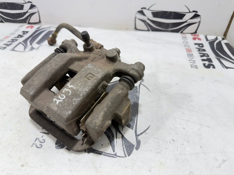 Суппорт тормозной задний левый Rogue 2019 T32 QR25 2.5