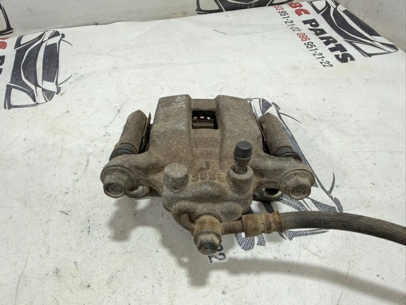 Суппорт тормозной задний левый Rogue 2019 T32 QR25 2.5