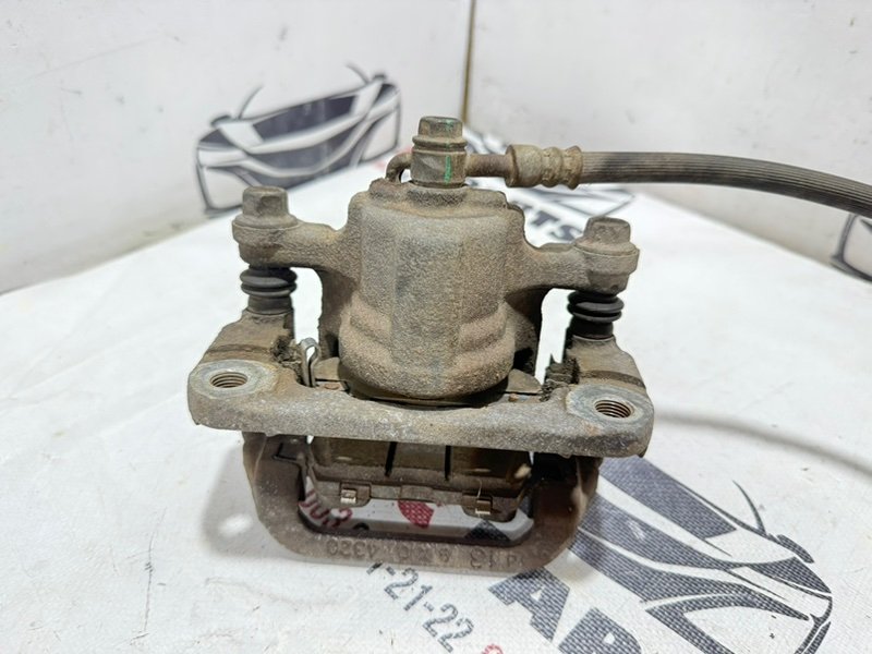 Суппорт тормозной задний левый Rogue 2019 T32 QR25 2.5