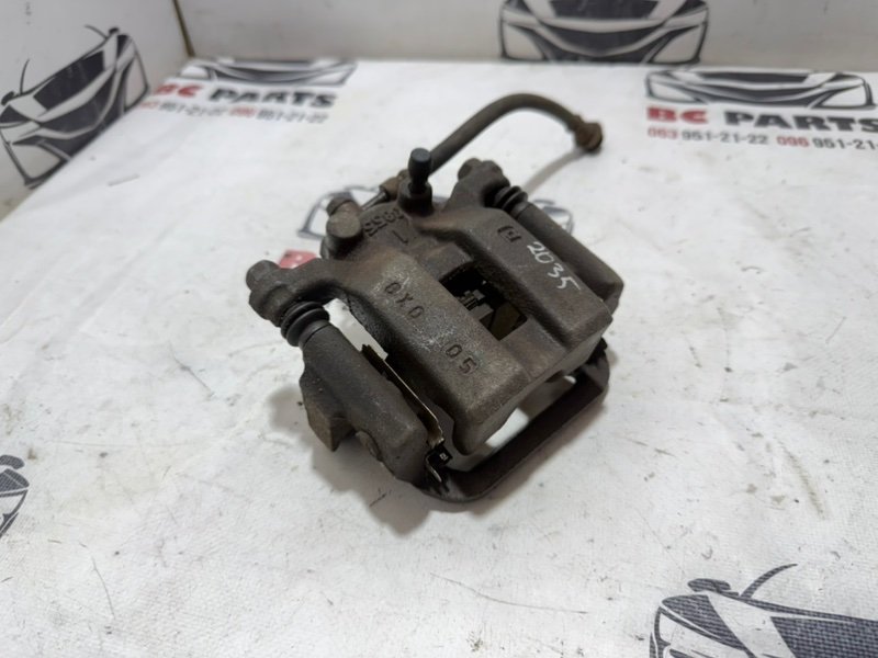 Суппорт тормозной задний правый Rogue 2019 T32 QR25 2.5