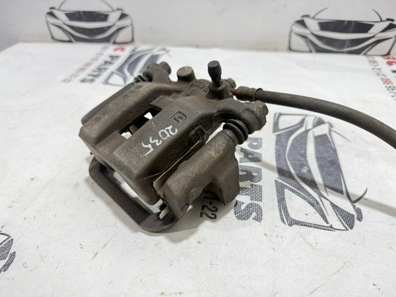 Суппорт тормозной задний правый Nissan Rogue T32 QR25 2.5