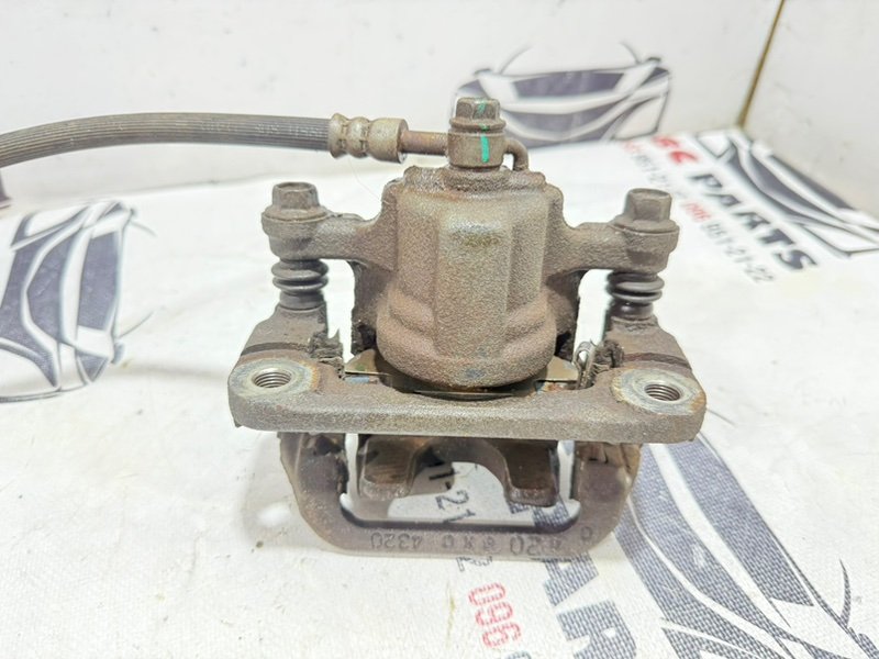 Суппорт тормозной задний правый Rogue 2019 T32 QR25 2.5