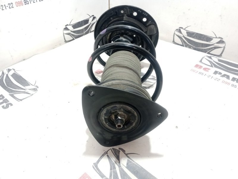 Стойка подвески передняя левая Nissan Rogue T33 2.5