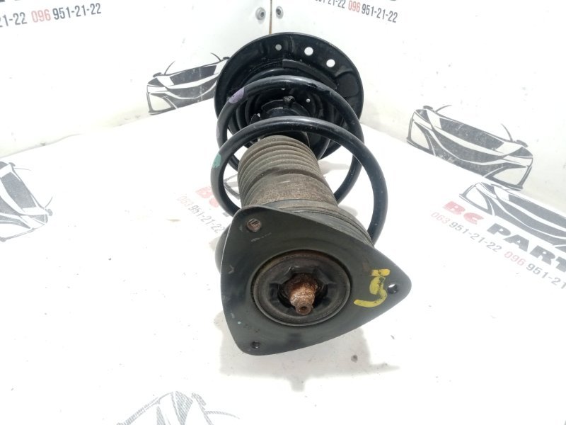 Стойка подвески передняя левая Nissan Rogue T33 2.5