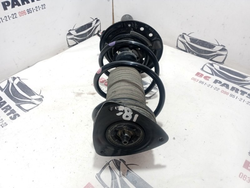 Стойка подвески передняя правая Nissan Rogue T33 2.5