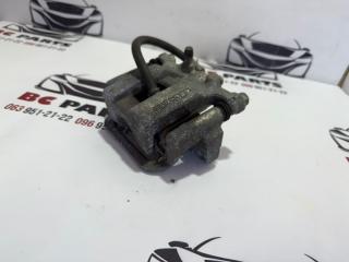 Суппорт тормозной задний левый Nissan Rogue T32