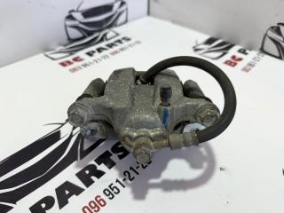 Суппорт тормозной задний левый Rogue 2013-2020 T32