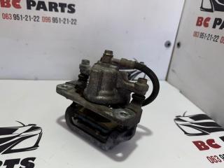 Суппорт тормозной задний левый Rogue 2013-2020 T32