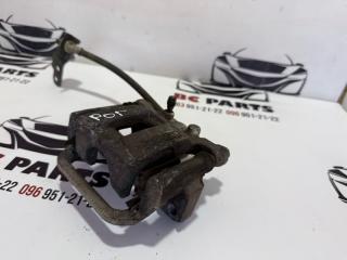 Суппорт тормозной задний левый Nissan Rogue T32