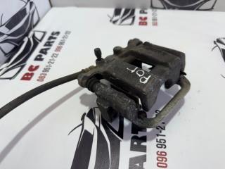 Суппорт тормозной задний левый Rogue 2013-2020 T32