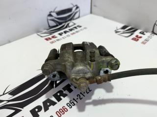 Суппорт тормозной задний левый Rogue 2013-2020 T32