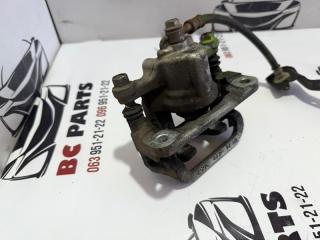 Суппорт тормозной задний левый Rogue 2013-2020 T32