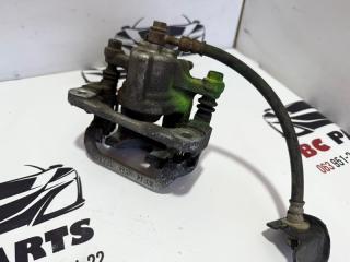 Суппорт тормозной задний левый Rogue 2013-2020 T32