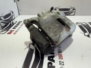 Суппорт тормозной передний левый Nissan Rogue T32