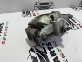 Суппорт тормозной передний левый Rogue 2013-2020 T32