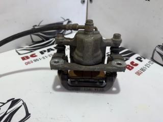 Суппорт тормозной задний правый Rogue 2013-2020 T32