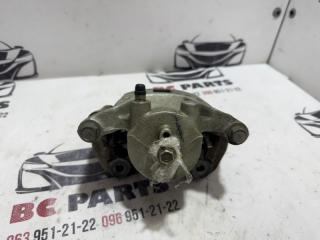 Суппорт тормозной передний левый Kicks 2021 1.6