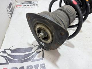 Стойка подвески передняя левая Nissan Rogue T33 2.5