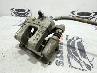 Суппорт тормозной задний левый Kia Sportage